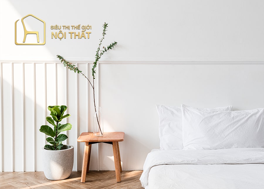 Mẫu thiết kế nội thất phòng ngủ tối giản với cây xanh dạng cảnh đặt trên ghế