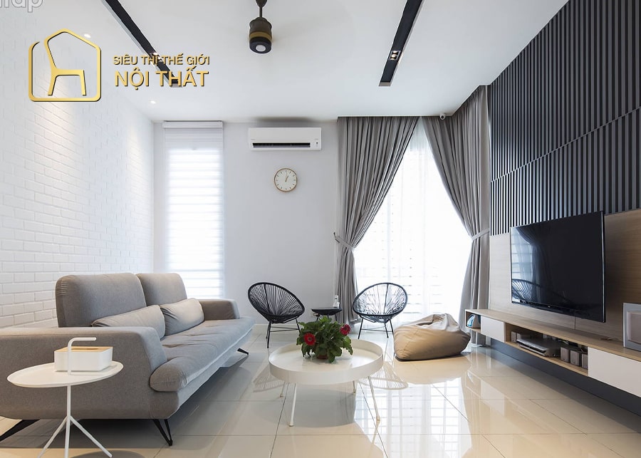 Mẫu phòng khách đẹp với cách bố trí nội thất tiện nghi, hiện đại với tone màu trung tính cho phòng khách biệt thự ngoài phố