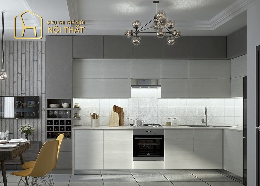 Mẫu nhà bếp nhỏ cực sang trọng với sự kết hợp tone trắng của cánh cửa tủ và chất liệu gỗ công nghiệp có màu gỗ sáng trẻ trung, giúp tiết kiệm chi phí