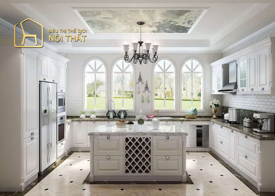 Mẫu tủ bếp chữ I sử dụng tone màu trắng với các đường nét hoa văn đối xứng giúp không gian bếp sang trọng mới mẻ