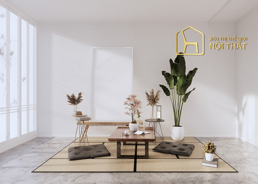 Phòng khách minimalist tối giản theo kiểu Bauhaus với thảm trải ngồi bệt và cây xanh trang trí