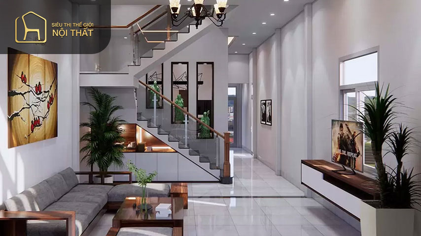 Mẫu phòng khách có cầu thang được thiết kế theo phong cách năng động Mẫu phòng khách có cầu thang được thiết kế theo phong cách năng động giúp căn phòng trở nên gọn gàng ngăn nắp