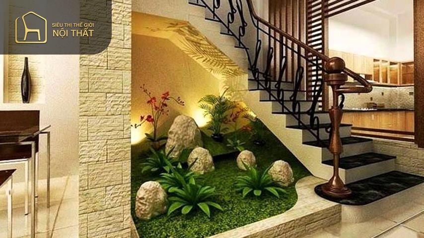 Cây cảnh sẽ giúp cho tường cầu thang trở nên tươi mới và sống động hơn