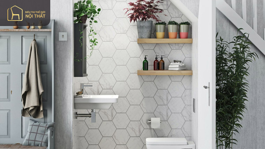Mẫu thiết kế nhà vệ sinh dưới gầm cầu thang có thiết kế cửa sổ và trang trí bắt mắt đang ngày càng trở nên phổ biến
